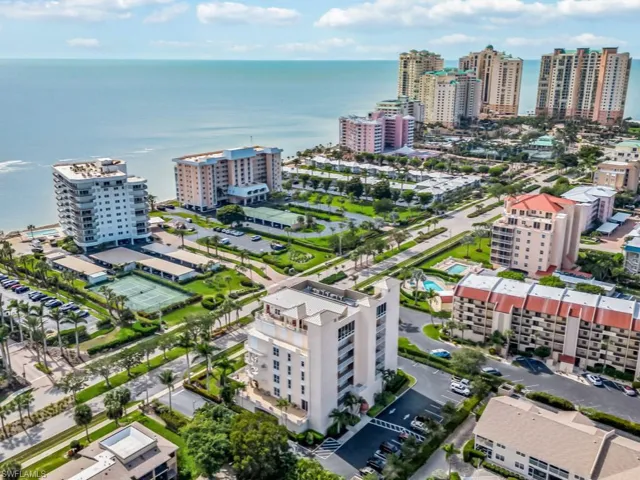 Drone / aerial view with a water view and a city view