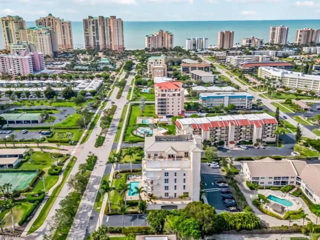 Aerial view with a water view and a city view