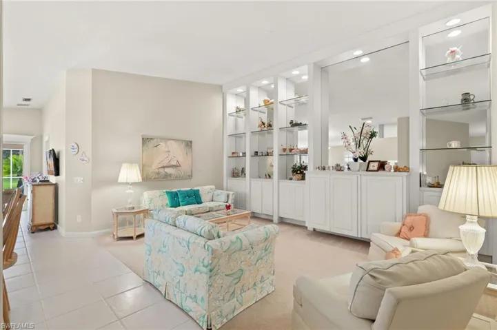 Living room with light tile patterned floors