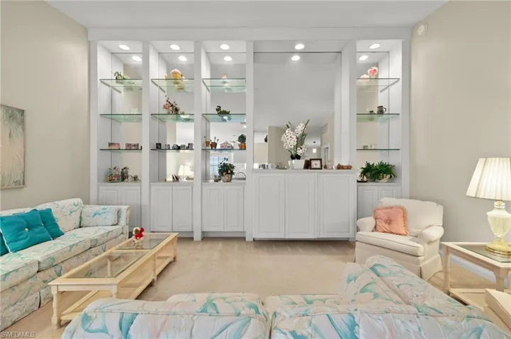 Living room with light colored carpet