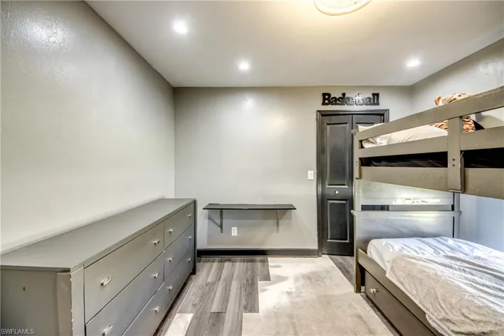 Bedroom featuring light wood-style floors and recessed lighting