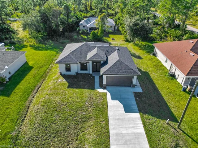 Aerial view of property and surrounding area
