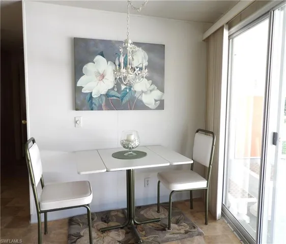 Dining space featuring a chandelier