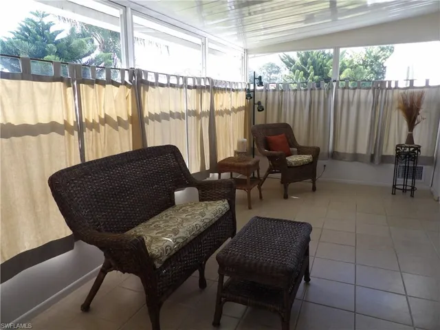 Fenced backyard featuring an outdoor hangout area