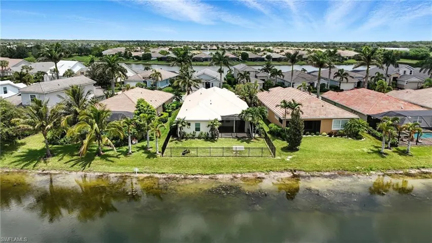 Aerial view of residential area with a large body of water