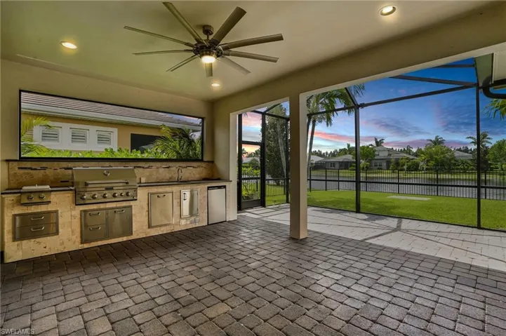 Unfurnished sunroom with a water view