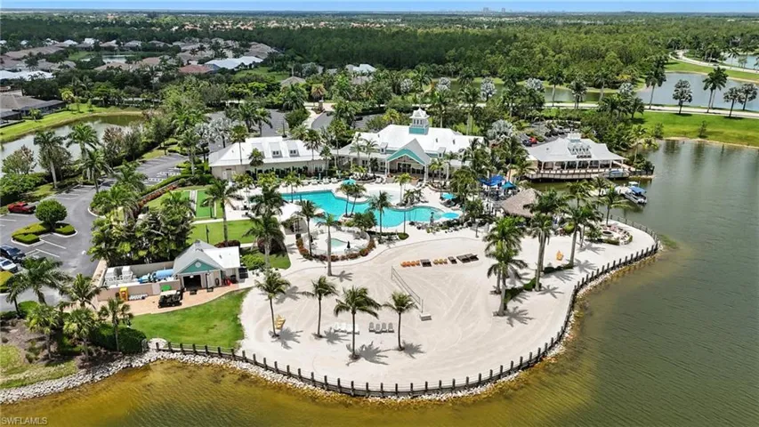 Aerial view of a nearby body of water and a pool