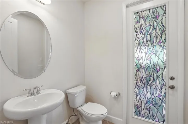 Bathroom with toilet and a sink