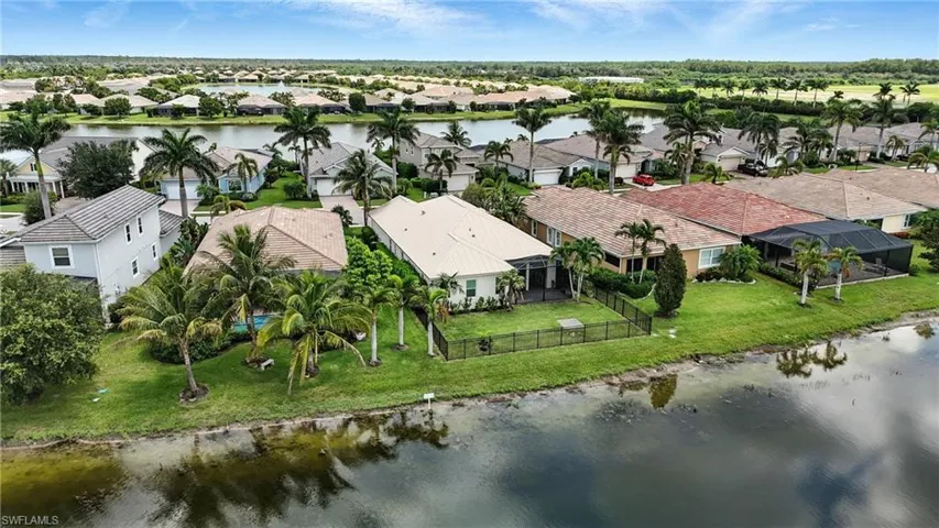 Aerial view of residential area with a large body of water