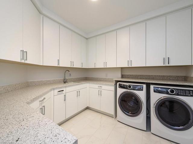 Greatly desired, this oversized Laundry Room meets all your needs!