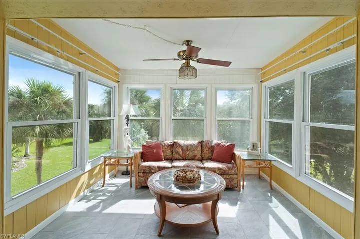 Sunroom / solarium with view of the canal.