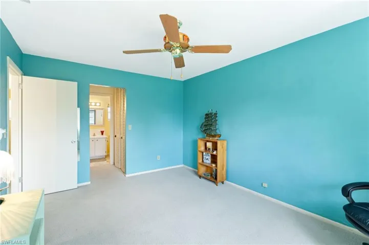 Walk-in closet as you enter the bathroom