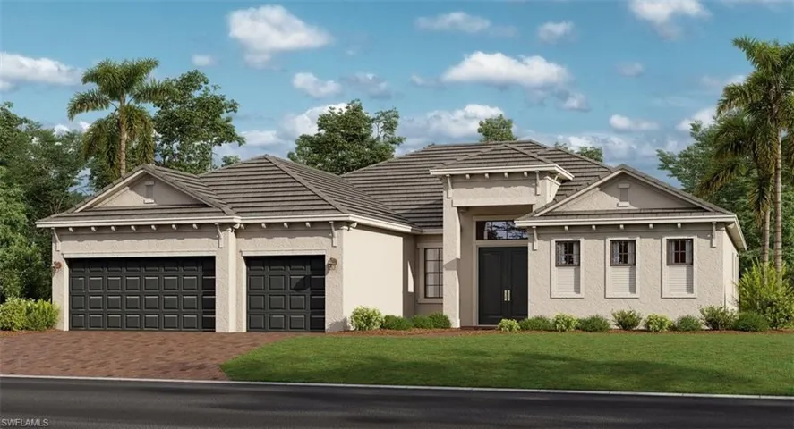 View of front of house with a garage and a front yard