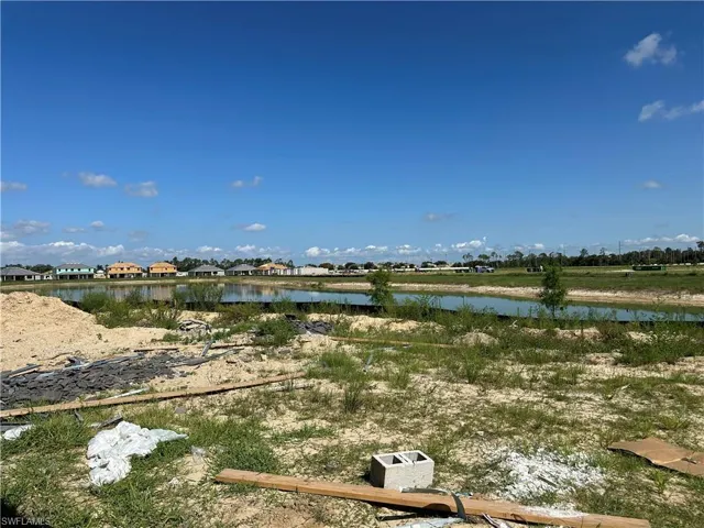 View of yard with a water view