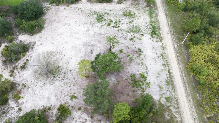 Aerial view of property and surrounding area with rural landscape