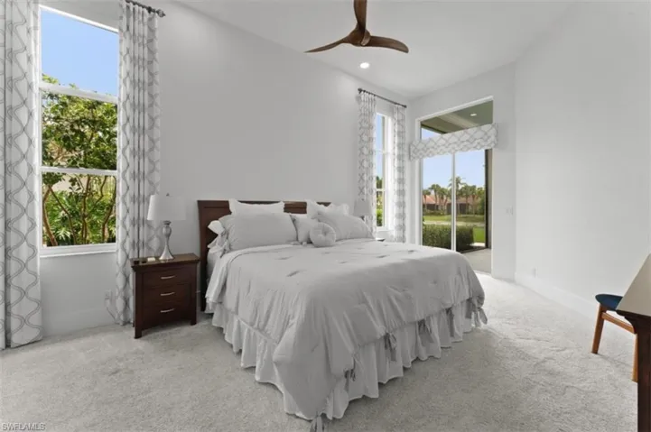 Bedroom featuring access to outside, carpet, ceiling fan, and recessed lighting