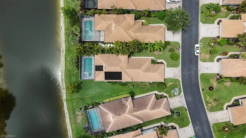 Aerial overview of property's location with a pool area
