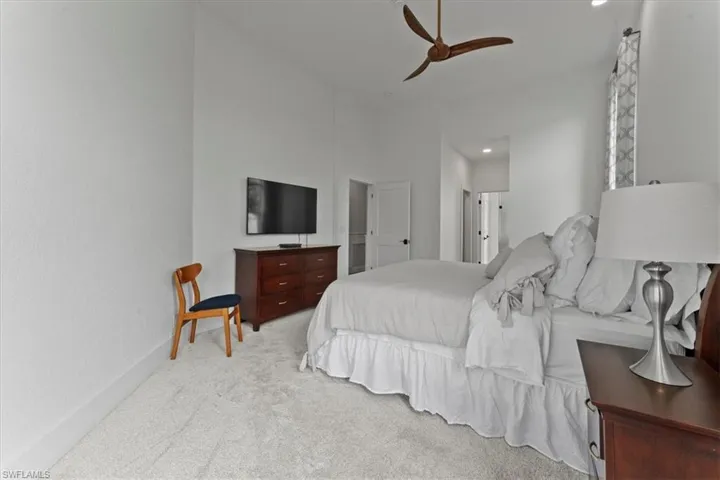 Bedroom with carpet floors and ceiling fan