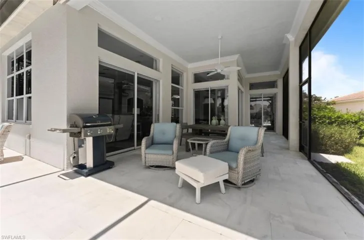 View of patio / terrace featuring a grill and a ceiling fan