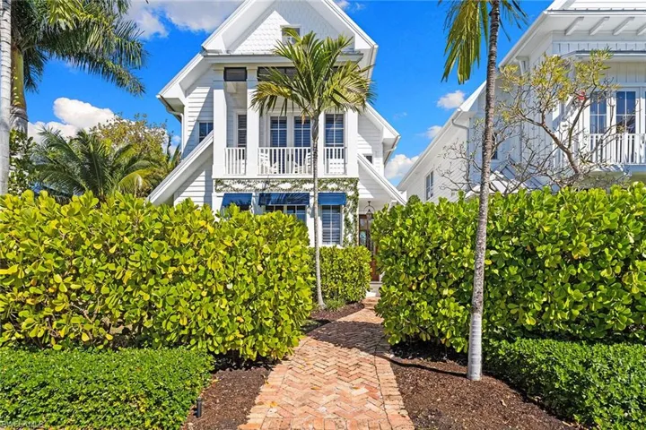 Rear view of property featuring a balcony