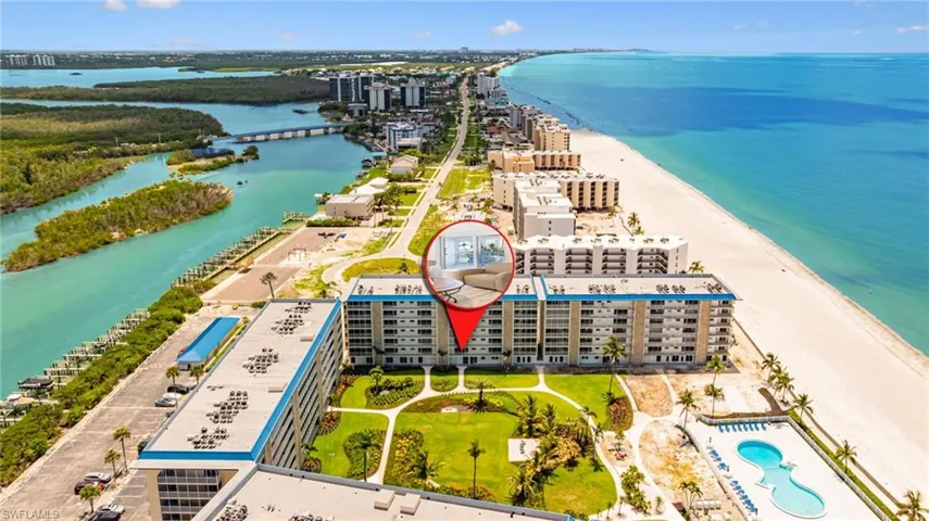 View of urban area featuring apartment complex / building and unending shoreline