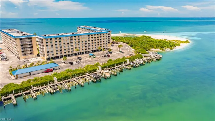Aerial view of a nearby body of water and apartment complex