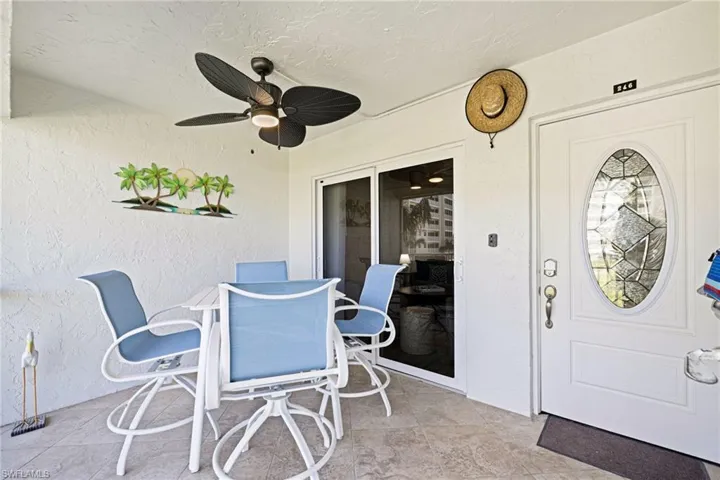 View of patio / terrace featuring outdoor dining area and a ceiling fan