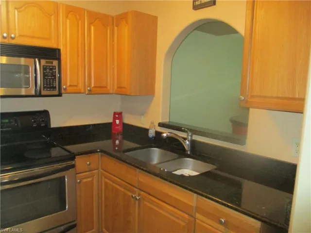 Kitchen featuring sink and stainless steel appliances
