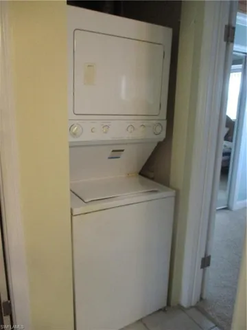 Laundry room with stacked washer / dryer