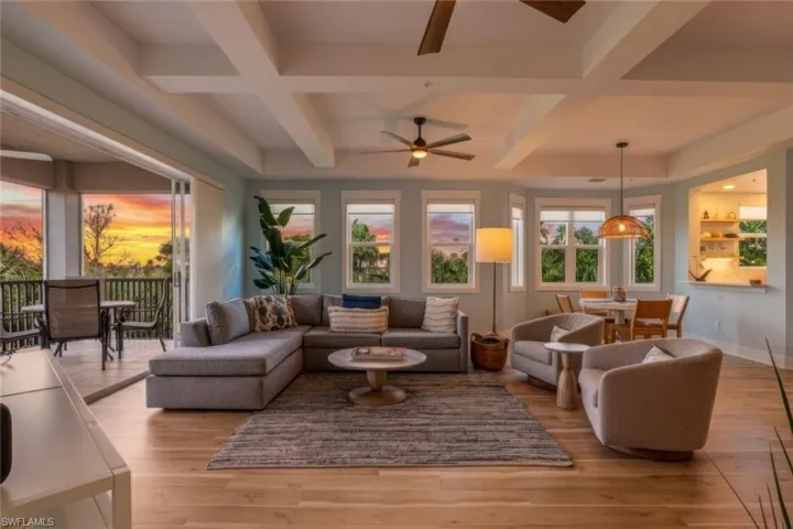 Sunroom / solarium with coffered ceiling and beam ceiling