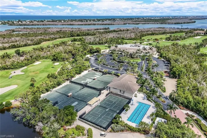 Aerial view of a large body of water and a local golf course