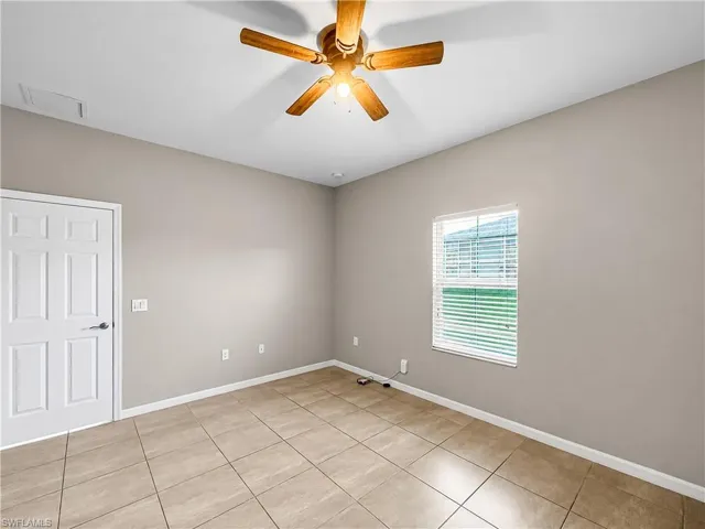 Square tile flooring complemented by neutral-toned walls