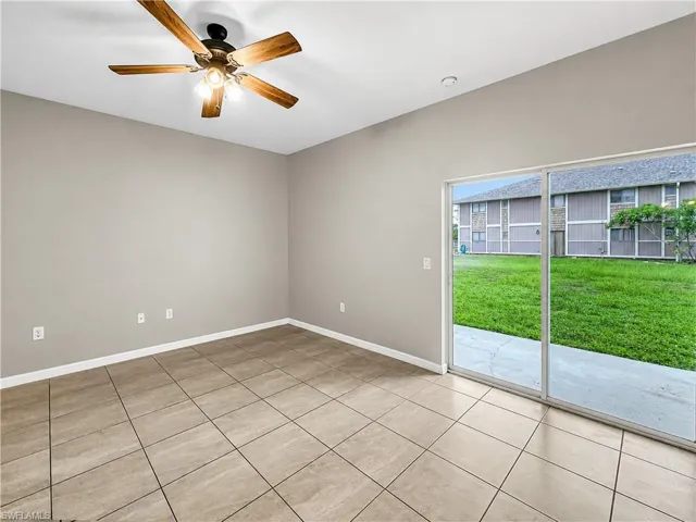 Neutral tone walls complementing tile flooring