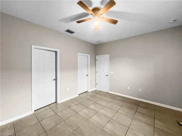 Neutral tone wall paint with tile flooring