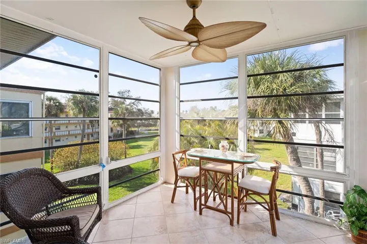 Sunroom with ceiling fan