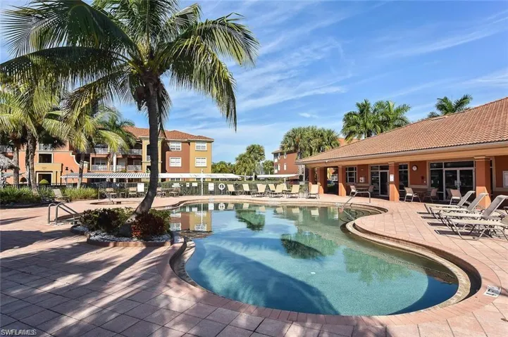 View of swimming pool with a patio area