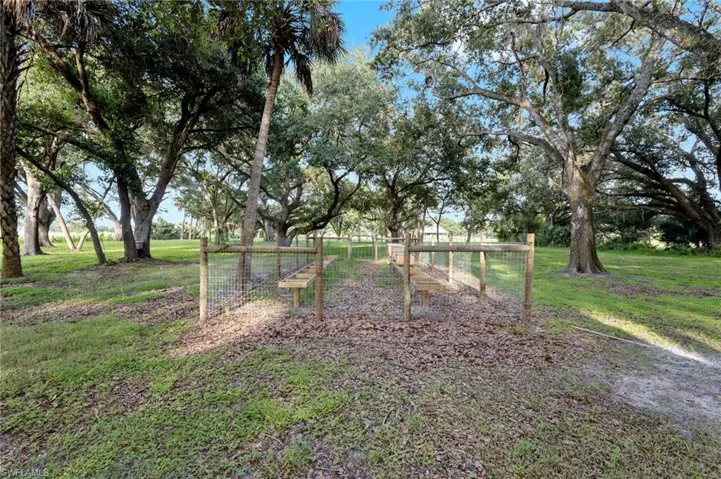 View of yard with a rural view