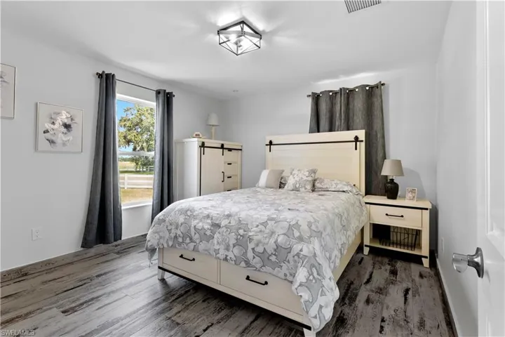 Bedroom featuring hardwood / wood-style floors