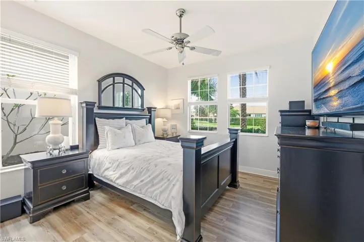 Bedroom featuring light wood-style floors and a ceiling fan