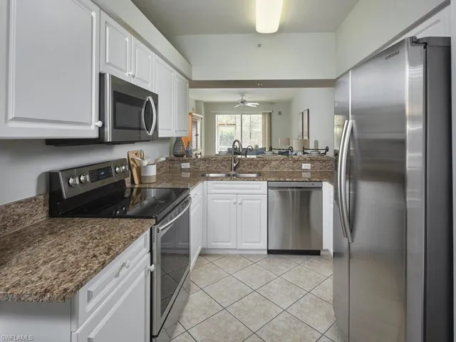 Kitchen with stainless steel appliances and granite countertops
