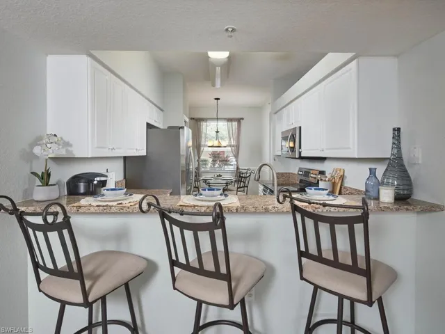 Breakfast Bar off of Kitchen