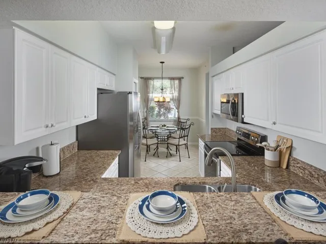 Kitchen with stainless steel appliances and granite countertops