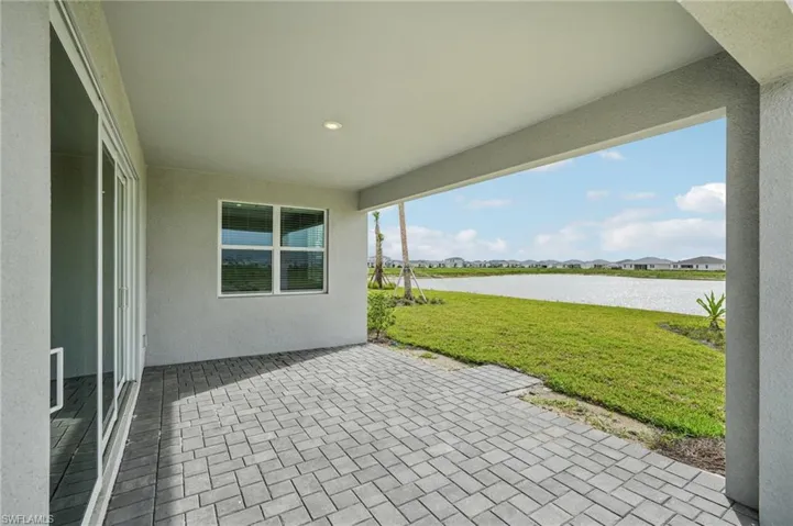 View of patio / terrace with a water view
