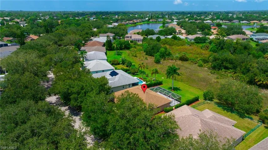 Aerial view of residential area with a nearby body of water