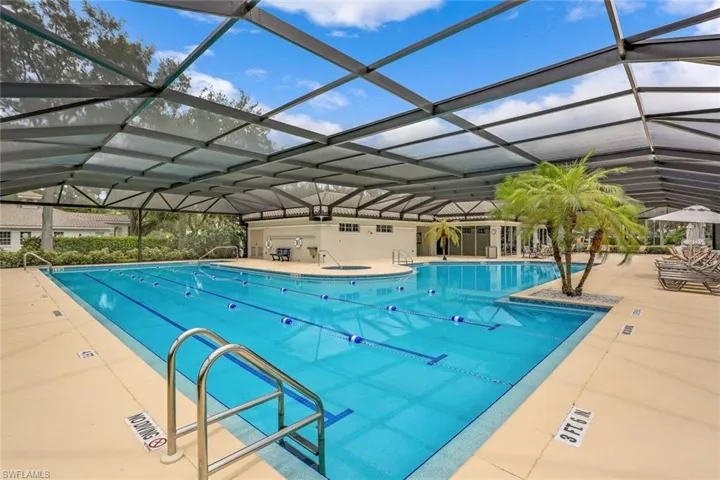 View of lap pool and large sun deck area