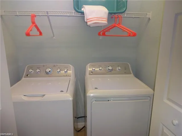 Laundry area with separate washer and dryer