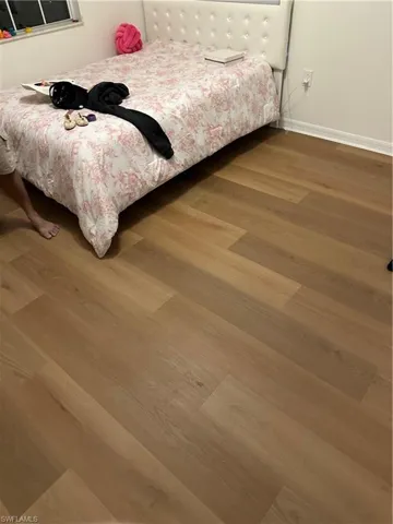 Bedroom featuring wood finished floors