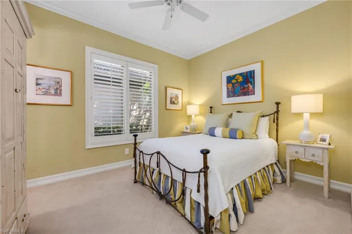 Guest bedroom 2 is spacious and has a large, walk-in closet.