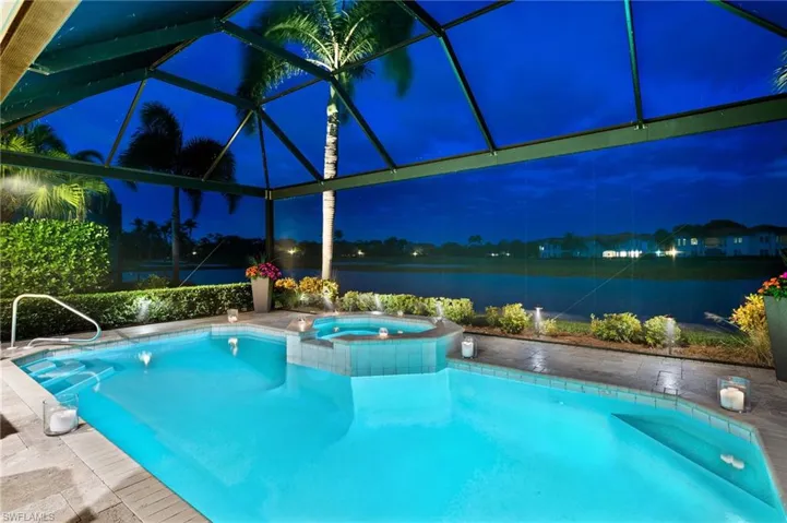 The evenings take on a special flair with these views and ambiance from the upgraded landscape lighting in the rear and front of this residence.