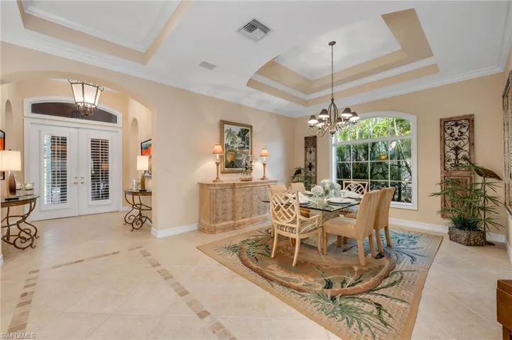 he dining room could be squared off, add half walls and glass, French doors...and converted into a den.  The possibilities are endless...